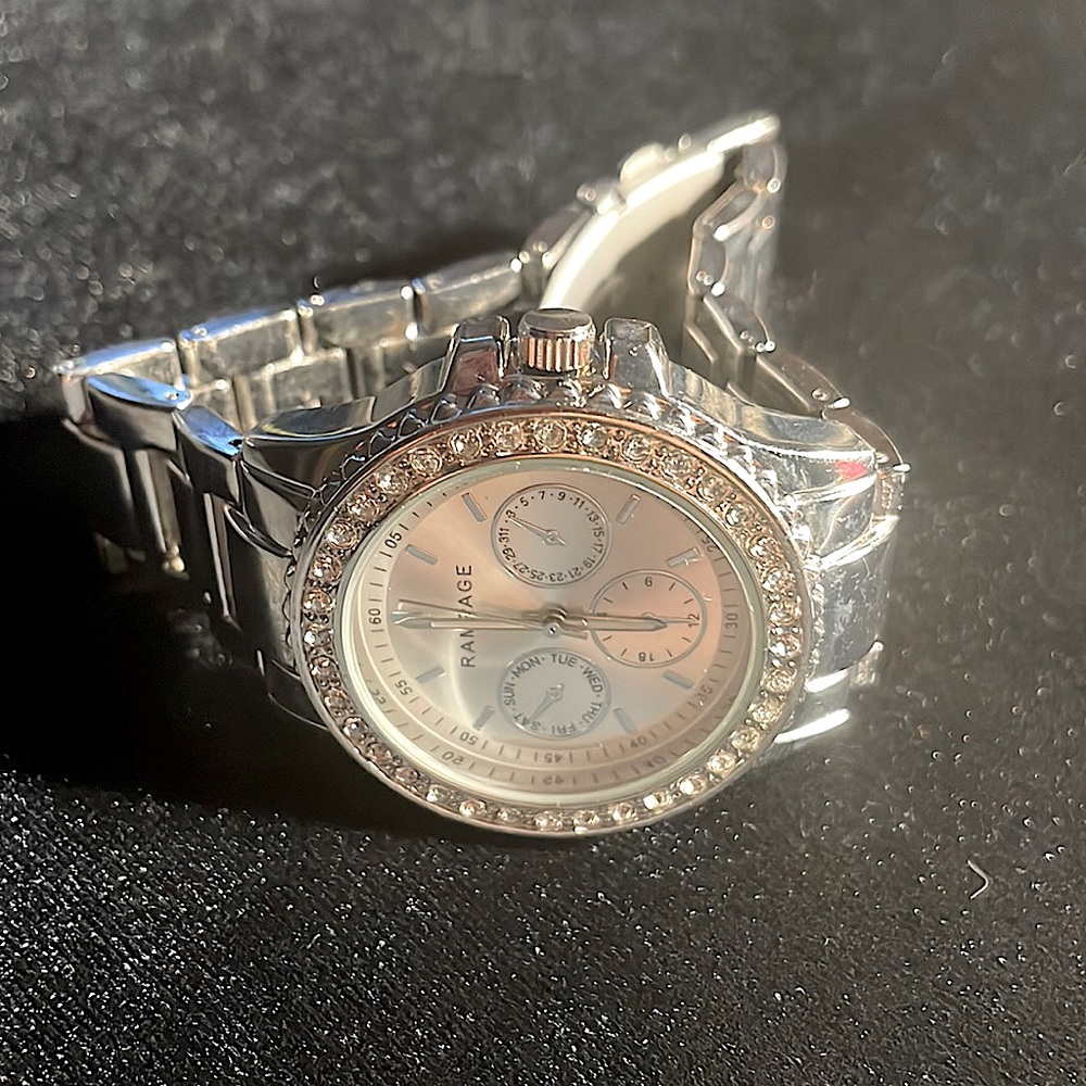 Rampage watch with 3 dials encrusted in a faux diamond round face